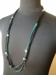 collana in tessuto verde e nero con charms argento lavorato e filo lurex 
